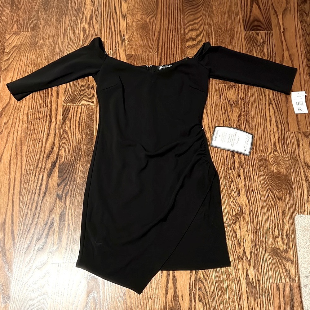 Brand New with tags black off the shoulder 3/4 sleeve mini dress